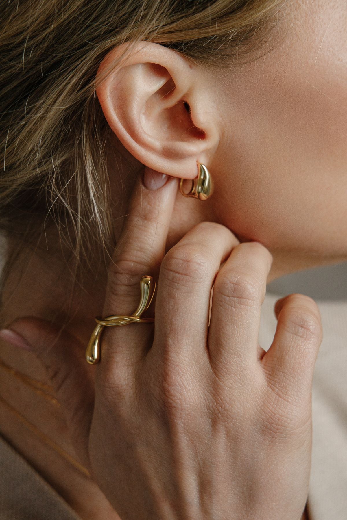 Extravagant large drop knot ring made of 925 silver gold-plated