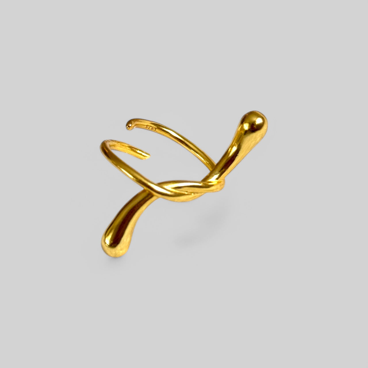 Extravagant large drop knot ring made of 925 silver gold-plated